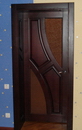 Двери деревянные из массива с резьбой